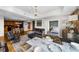 Bright open concept living space with eat in kitchen, modern furnishings, and adjoining bedroom with king bed at 2881 Peachtree Ne Rd # 1102, Atlanta, GA 30305