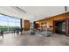 Elegant living room with wood paneling and a grand piano at 2881 Peachtree Ne Rd # 1102, Atlanta, GA 30305