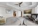 Spacious primary bedroom with a balcony, natural light, and elegant furnishings at 2881 Peachtree Ne Rd # 1102, Atlanta, GA 30305