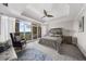 Spacious main bedroom with sitting area, balcony access, and neutral tones at 2881 Peachtree Ne Rd # 1102, Atlanta, GA 30305