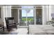 Bedroom featuring a seating area and a balcony with a scenic view at 2881 Peachtree Ne Rd # 1102, Atlanta, GA 30305