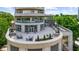 Spacious rooftop terrace with elegant patio furniture, lush greenery, and panoramic city views at 2881 Peachtree Ne Rd # 1102, Atlanta, GA 30305