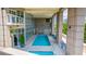 Indoor swimming pool with floor to ceiling glass windows for natural light at 2881 Peachtree Ne Rd # 1102, Atlanta, GA 30305