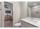 Modern bathroom adjacent to the bedroom, featuring a stylish vanity and toilet at 307 Cedar Dust Dr, Decatur, GA 30030