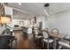 Open concept floorplan featuring a dining room, kitchen and living room with dark wood flooring at 307 Cedar Dust Dr, Decatur, GA 30030