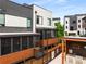 The modern townhome has an outdoor kitchen and a private screened in balcony at 307 Cedar Dust Dr, Decatur, GA 30030
