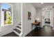 Hallway with a desk, staircase, large window and view into another bedroom gives a spacious, modern feel at 307 Cedar Dust Dr, Decatur, GA 30030