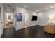 Cozy living space featuring hardwood floors, recessed lighting, and access to the bedroom and bathroom at 307 Cedar Dust Dr, Decatur, GA 30030