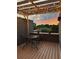 Inviting outdoor patio with string lights and a beautiful sunset view, perfect for relaxing or entertaining at 307 Cedar Dust Dr, Decatur, GA 30030