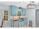 Kitchen featuring stainless steel appliances, updated cabinets, butcher block countertops, and natural light at 3178 Booths Ct, Dacula, GA 30019
