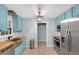 Modern kitchen with stainless steel appliances, butcher block countertops and lots of cabinet space at 3178 Booths Ct, Dacula, GA 30019