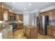 Spacious kitchen boasts stainless steel appliances, a center island, and ample cabinet space at 4765 Silver Leaf Dr, Cumming, GA 30040