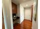 Coffee bar with dark cabinetry, updated appliances, and sleek black countertops at 860 Peachtree Ne St # 1411, Atlanta, GA 30308