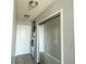 Hallway with mirrored closet, laundry, overhead lighting and modern design at 860 Peachtree Ne St # 1411, Atlanta, GA 30308