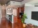 Contemporary kitchen with stainless steel appliances, granite countertops, and barstool seating at 860 Peachtree Ne St # 1411, Atlanta, GA 30308