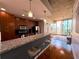 Open concept kitchen with granite countertop bar, stainless steel appliances, and bar stool seating at 860 Peachtree Ne St # 1411, Atlanta, GA 30308