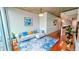 Cozy living room with modern furnishings, a decorative rug and access to other rooms at 860 Peachtree Ne St # 1411, Atlanta, GA 30308
