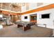 Spacious lounge with a pool table, media area, and comfortable seating at 860 Peachtree Ne St # 1411, Atlanta, GA 30308