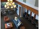 Lounge room features comfortable seating arrangements, a large chandelier, and workspace for residents at 860 Peachtree Ne St # 1411, Atlanta, GA 30308