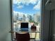 Bright office space with cityscape views, featuring a functional desk setup at 860 Peachtree Ne St # 1411, Atlanta, GA 30308