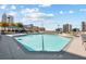 Rooftop pool with city skyline views and lounge chairs for relaxing at 860 Peachtree Ne St # 1411, Atlanta, GA 30308