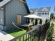 Cozy backyard with artificial turf, hammock, and fenced perimeter at 1248 Windmill Pkwy # 240, Cumming, GA 30041