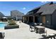 Community pool with grilling and lounging area and outdoor dining at 1248 Windmill Pkwy # 240, Cumming, GA 30041