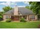 Back exterior featuring a screened deck perfect for outdoor gatherings at 65 Wisteria Blvd, Covington, GA 30016