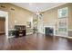 Spacious living room features a fireplace, an aquarium, and plenty of natural light at 65 Wisteria Blvd, Covington, GA 30016