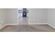 Open-concept living area showcasing seamless transition into the adjacent kitchen at 6595 Oakwood Dr, Douglasville, GA 30135
