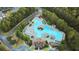 Aerial view of the neighborhood's resort-style pool, water slides and well manicured green space at 209 Wildwood Way, Canton, GA 30114