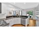 View of the kitchen, with stainless steel appliances, granite counters, and white cabinets at 209 Wildwood Way, Canton, GA 30114