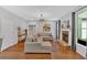 Spacious living room with a stone fireplace, hardwood floors, and neutral colors at 209 Wildwood Way, Canton, GA 30114