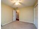 Bedroom featuring carpet flooring and walk-in closets at 3177 Westfield Ne Way, Roswell, GA 30075