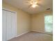 A bedroom featuring a large closet and window at 3177 Westfield Ne Way, Roswell, GA 30075