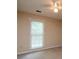 Bedroom featuring carpet flooring and natural light at 3177 Westfield Ne Way, Roswell, GA 30075
