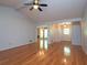 Spacious living room features vaulted ceiling, fan and gleaming hardwood floors at 3177 Westfield Ne Way, Roswell, GA 30075