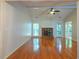 Open-concept living room showcases a fireplace, hardwood floors and great natural light at 3177 Westfield Ne Way, Roswell, GA 30075