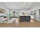 Bright kitchen featuring a dining nook, stainless steel appliances, and a large kitchen island with an open display area at 3264 Andante Ne Dr, Marietta, GA 30062