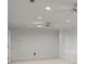 Open basement space with recessed lighting, carpet, and modern ceiling fans at 4085 Tritt Homestead Dr, Marietta, GA 30062