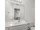 Bathroom features a large mirror, a white sink and vanity, and ample counter space at 4085 Tritt Homestead Dr, Marietta, GA 30062