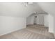 A bright bedroom has vaulted ceilings, plush carpeting, and a neutral color palette at 4085 Tritt Homestead Dr, Marietta, GA 30062