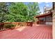 Spacious wooden deck overlooking mature trees and backyard at 4085 Tritt Homestead Dr, Marietta, GA 30062