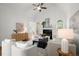 Bright and airy living room with a vaulted ceiling, fireplace, and an open floor plan at 4085 Tritt Homestead Dr, Marietta, GA 30062