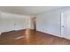 Large primary bedroom with hardwood floors and neutral paint at 5124 Vermack Rd, Dunwoody, GA 30338
