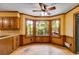 Sunny breakfast nook features a bay window offering verdant views at 5124 Vermack Rd, Dunwoody, GA 30338