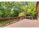 Spacious deck overlooking a lush backyard and mature trees at 5124 Vermack Rd, Dunwoody, GA 30338