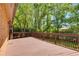 Spacious deck overlooking a lush backyard with mature trees at 5124 Vermack Rd, Dunwoody, GA 30338