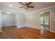 Living room with hardwood floors and view of the patio through French doors at 802 San Miguel Dr, Stone Mountain, GA 30083