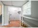 Functional utility area with tile flooring, shelving, and washer/dryer hookups at 802 San Miguel Dr, Stone Mountain, GA 30083